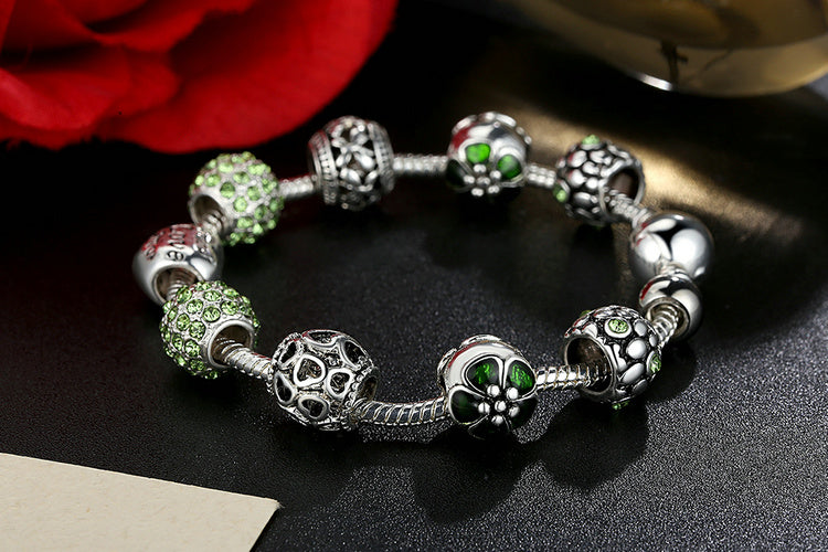 Silver Plated Charm Bracelet with Flower and Love Beads