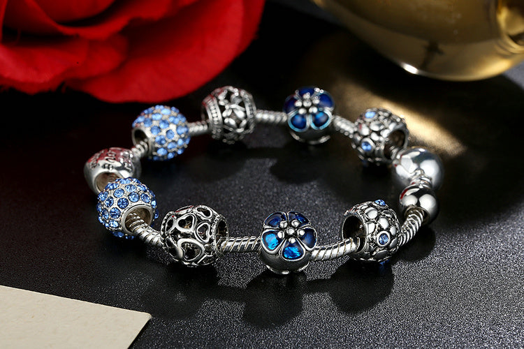 Silver Plated Charm Bracelet with Flower and Love Beads